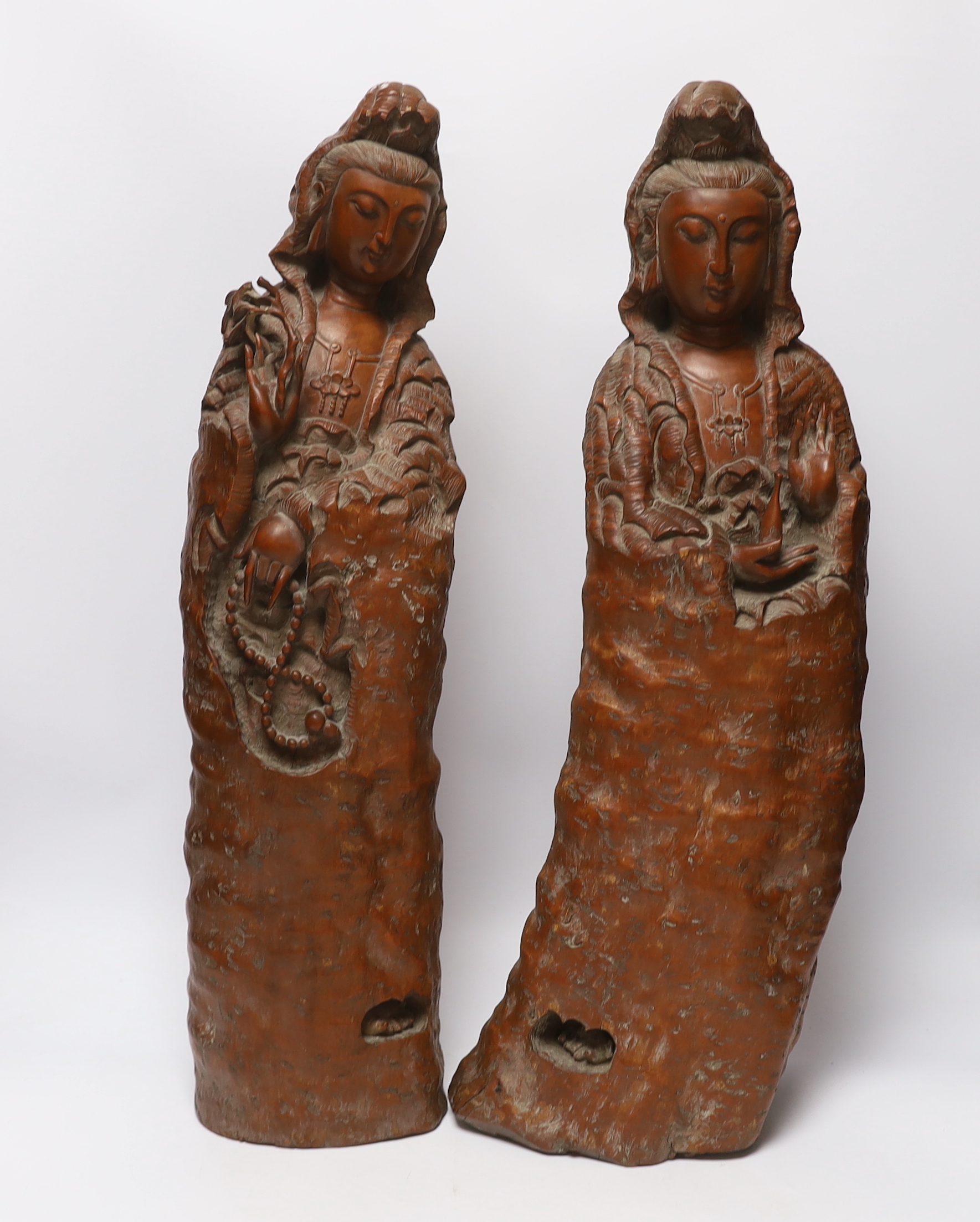 Two large Chinese rootwood figures of Guanyin, 57cm high